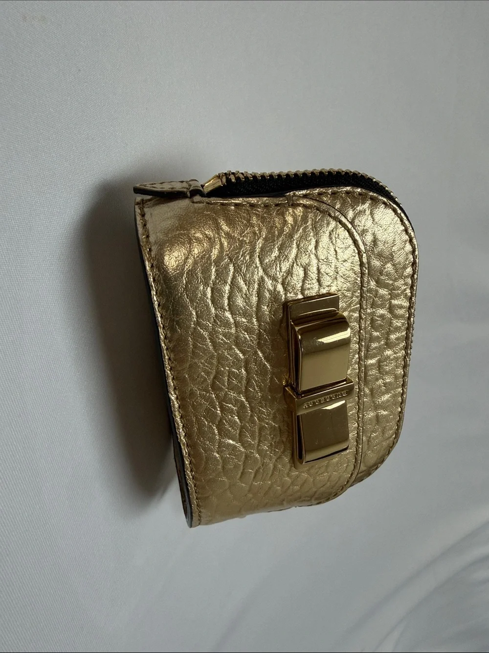 Burberry Metallic Gold Textured Mini Bow-Accent Pouch